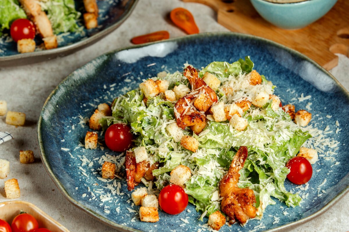 Caesar salad with fried shrimps