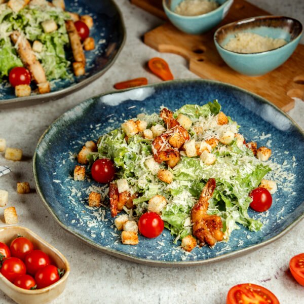 Caesar salad with fried shrimps