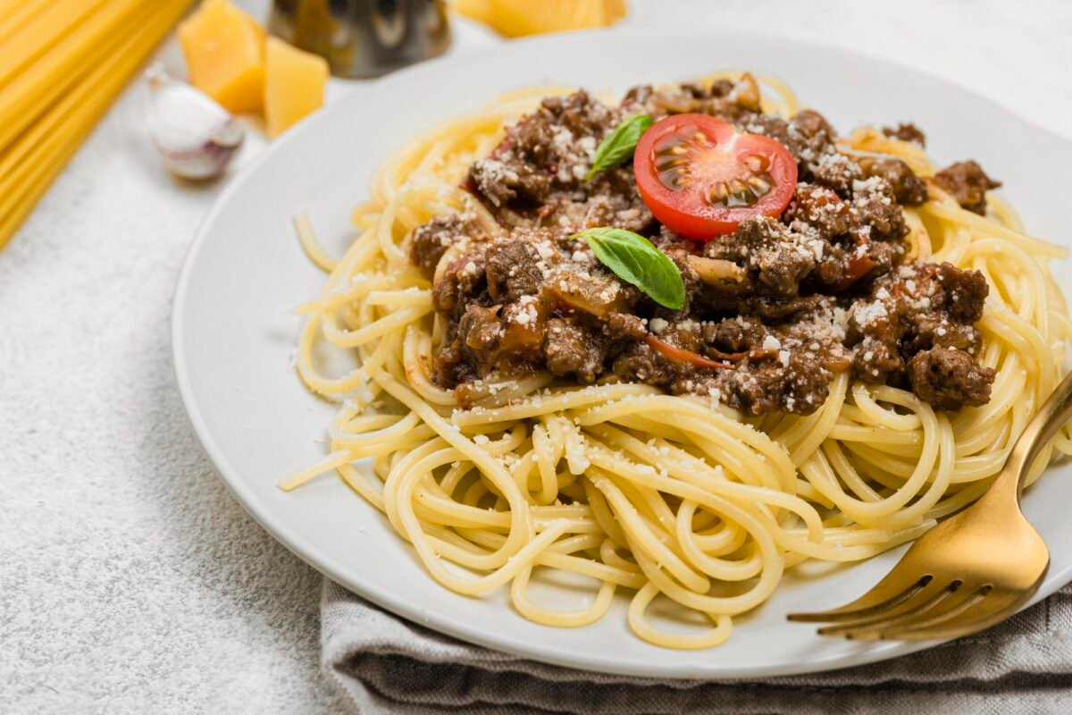 Plate with spaghetii bolognese close up