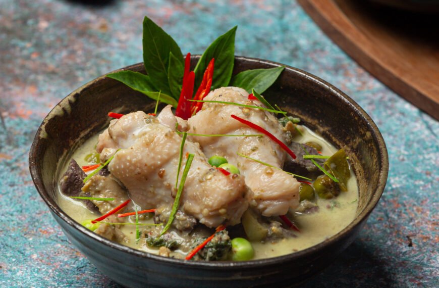 Rice noodles, chicken green curry, coconut milk thai food.