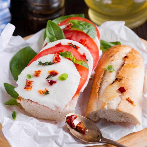 Tasty baguette with mozzarella plate