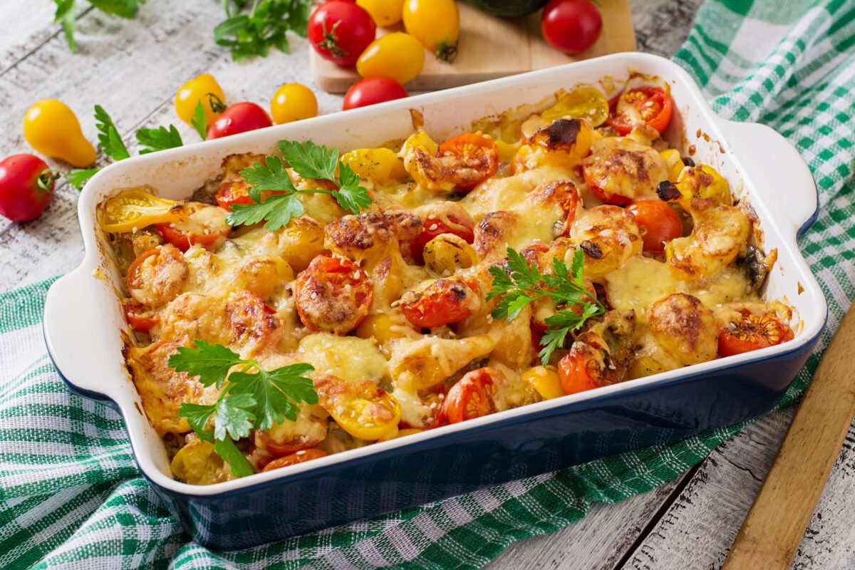 Vegetarian vegetable casserole with zucchini, mushrooms and cherry tomatoes